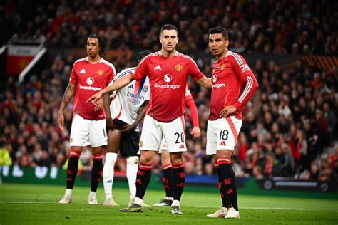 Joueurs de Manchester United célébrant une victoire