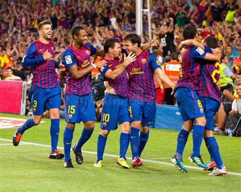 Joueurs de foot célébrant un but